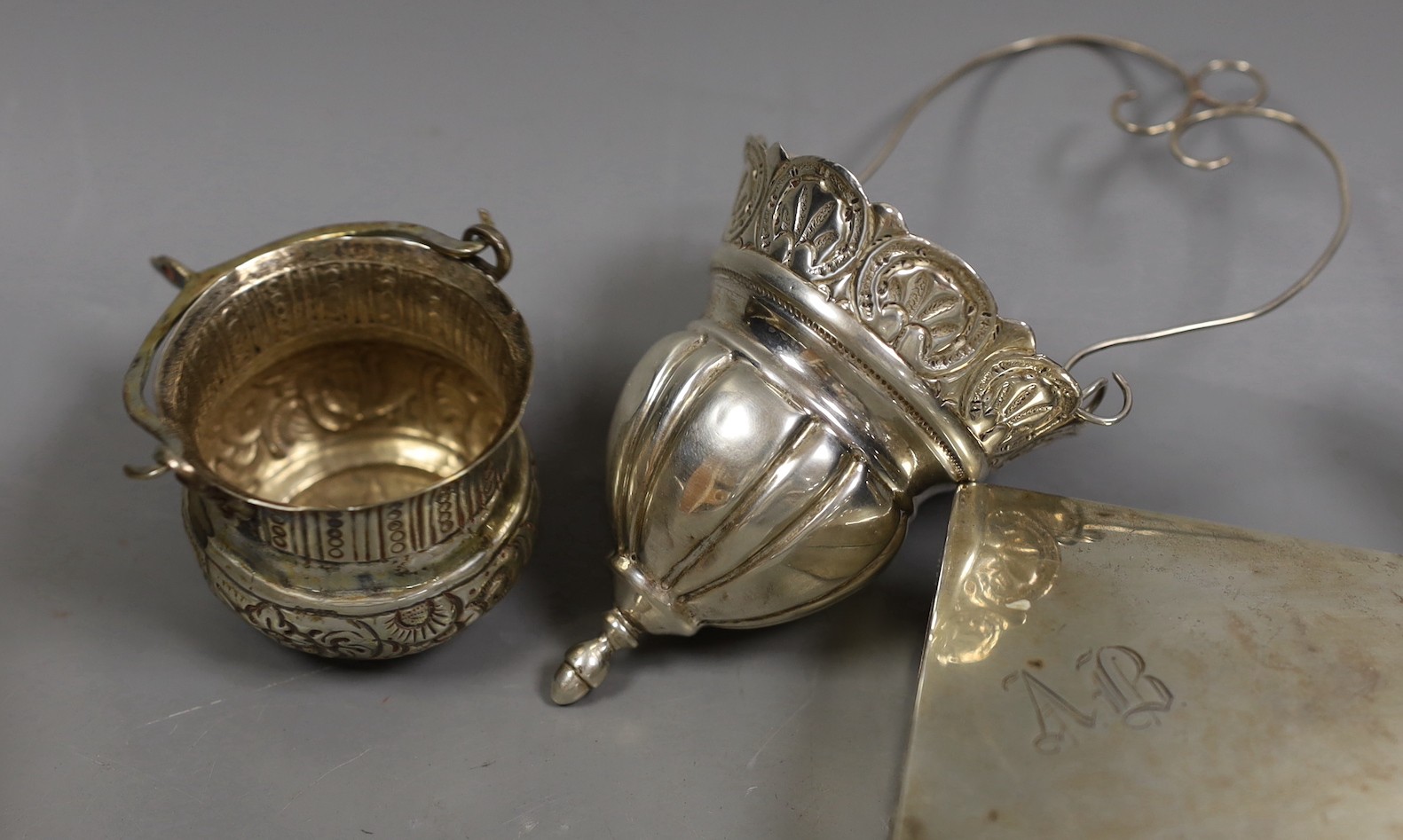 A small mixed lot of silver to include two cigarette boxes, salts and a mustard.